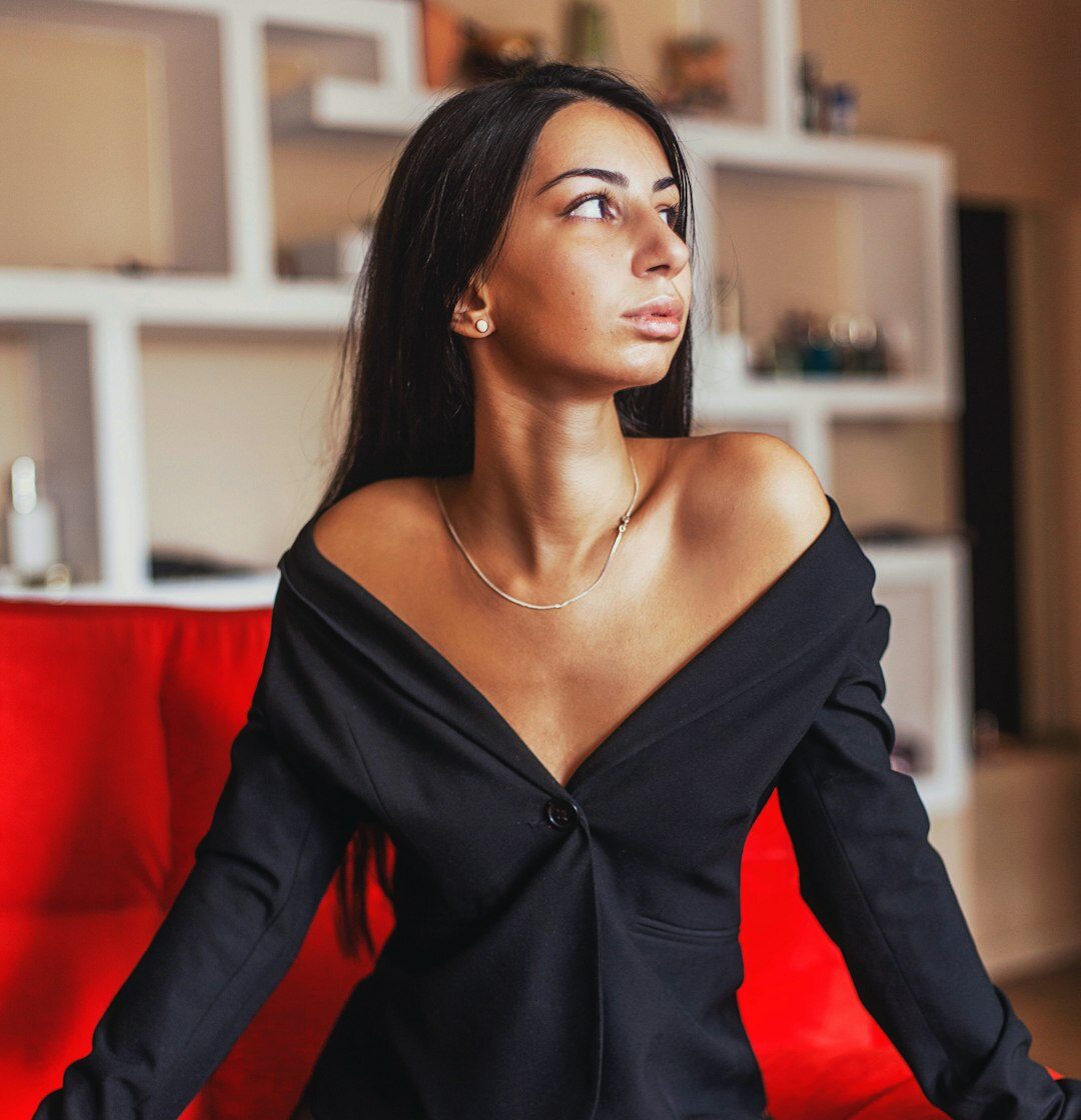 Elegant woman in evening gown posing for a portrait