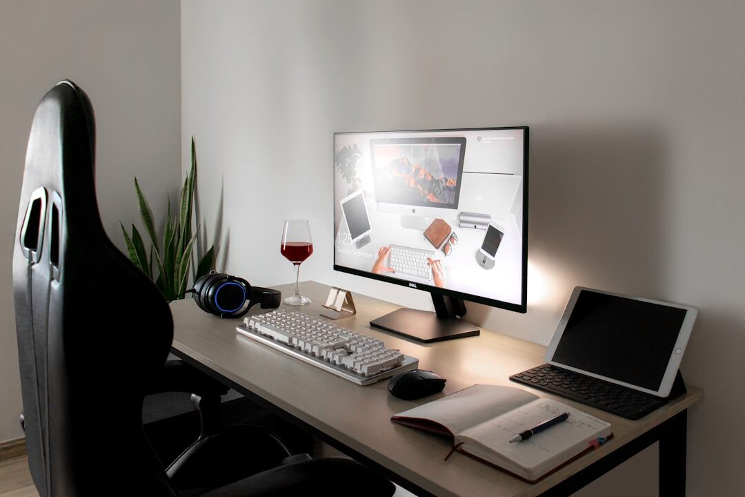 Elegant editor's desk with magazines, laptop and coffee